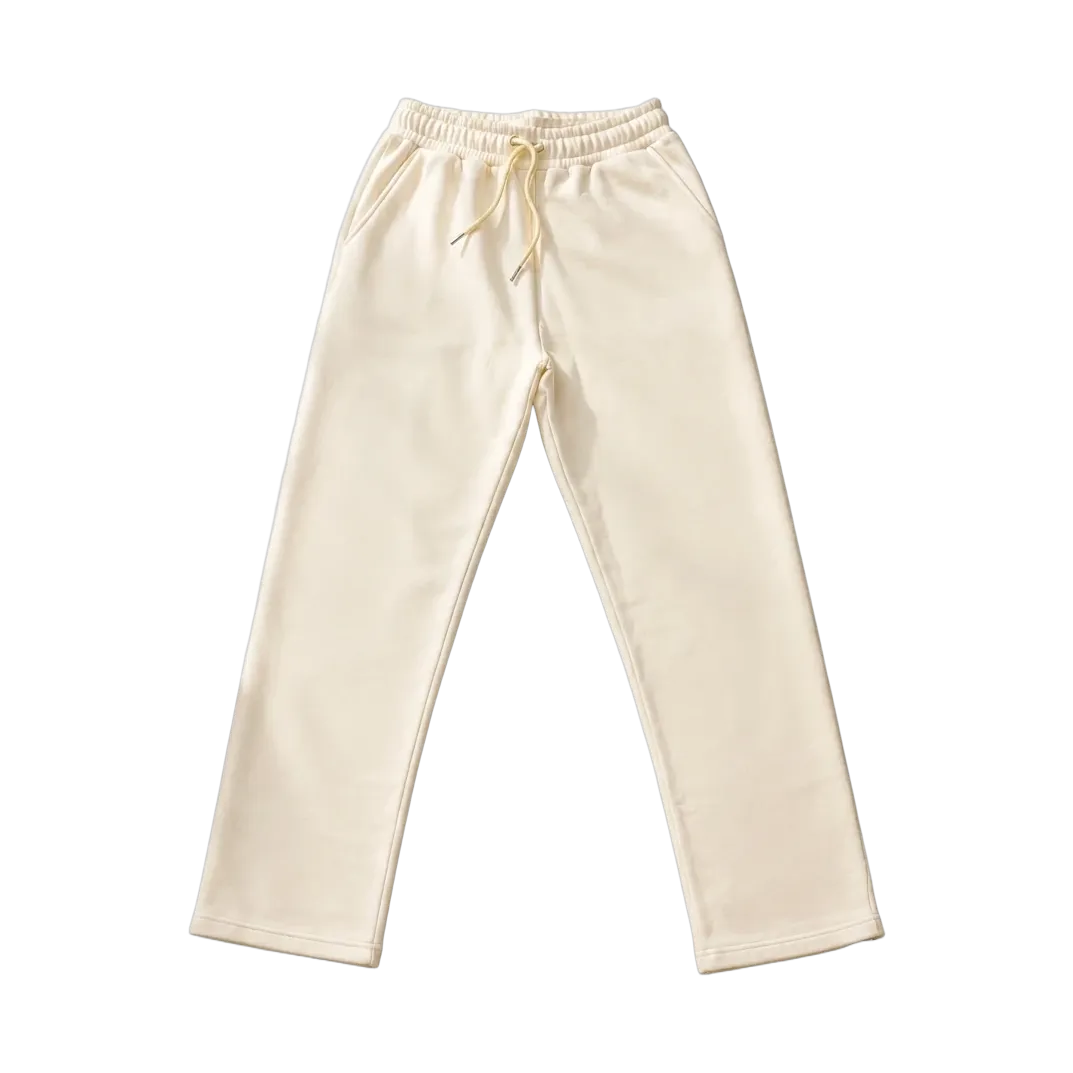 Cream MAFI sweatpants with a script logo at the thigh