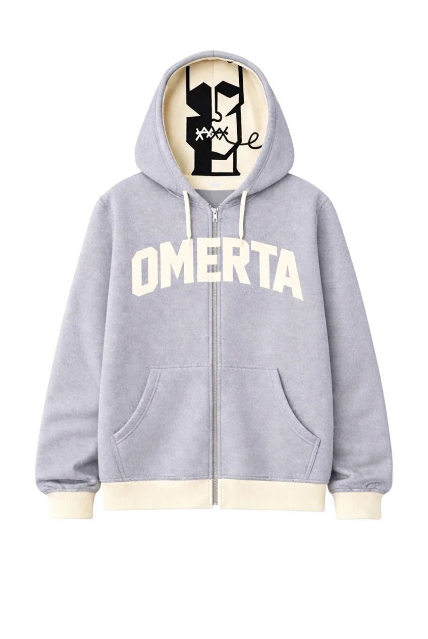 Omertà Varsity Zip Hoodie in heather grey with cream arched OMERTA lettering and face print in the hood